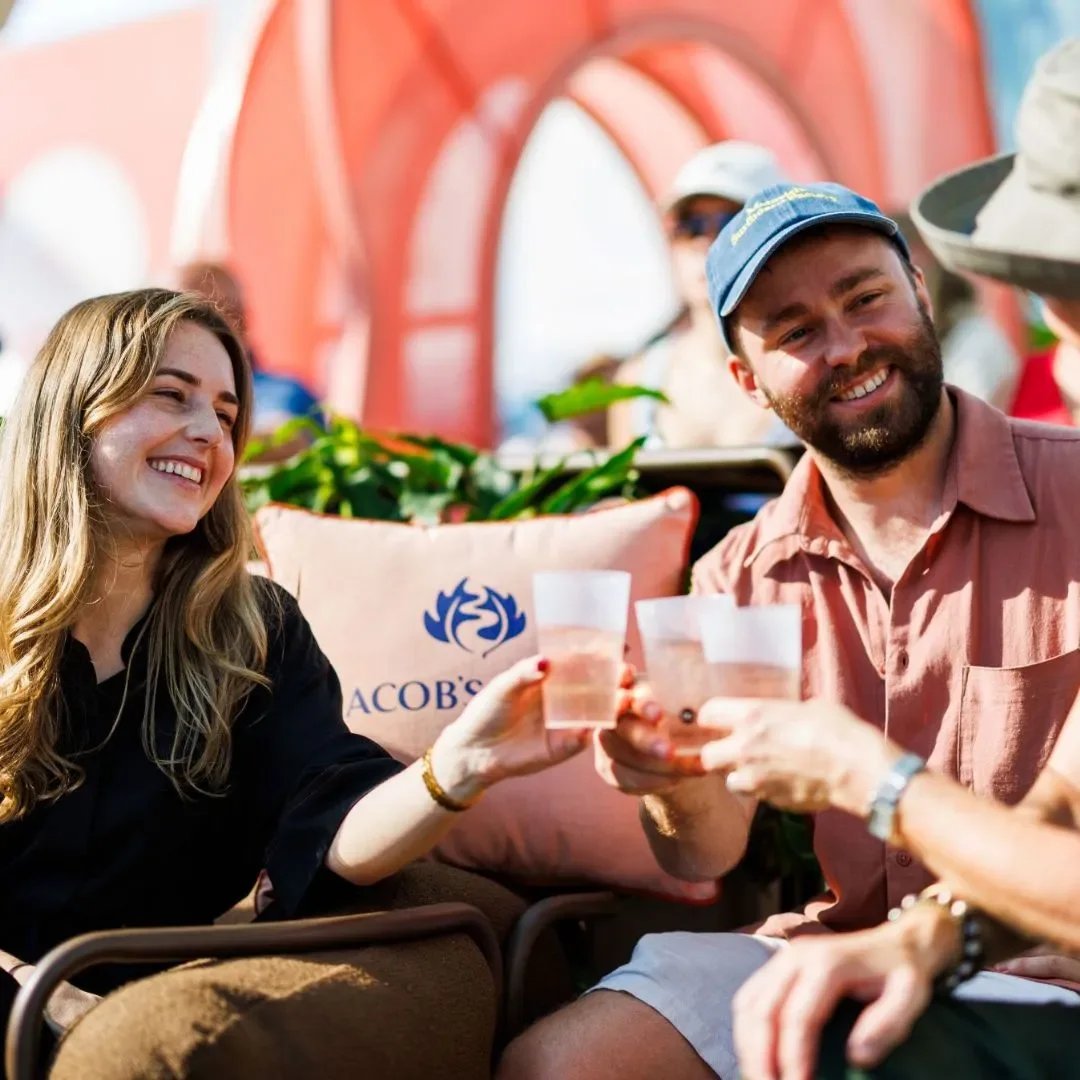 People cheering with custom stemless bettercup in hand at Australian Open 2026