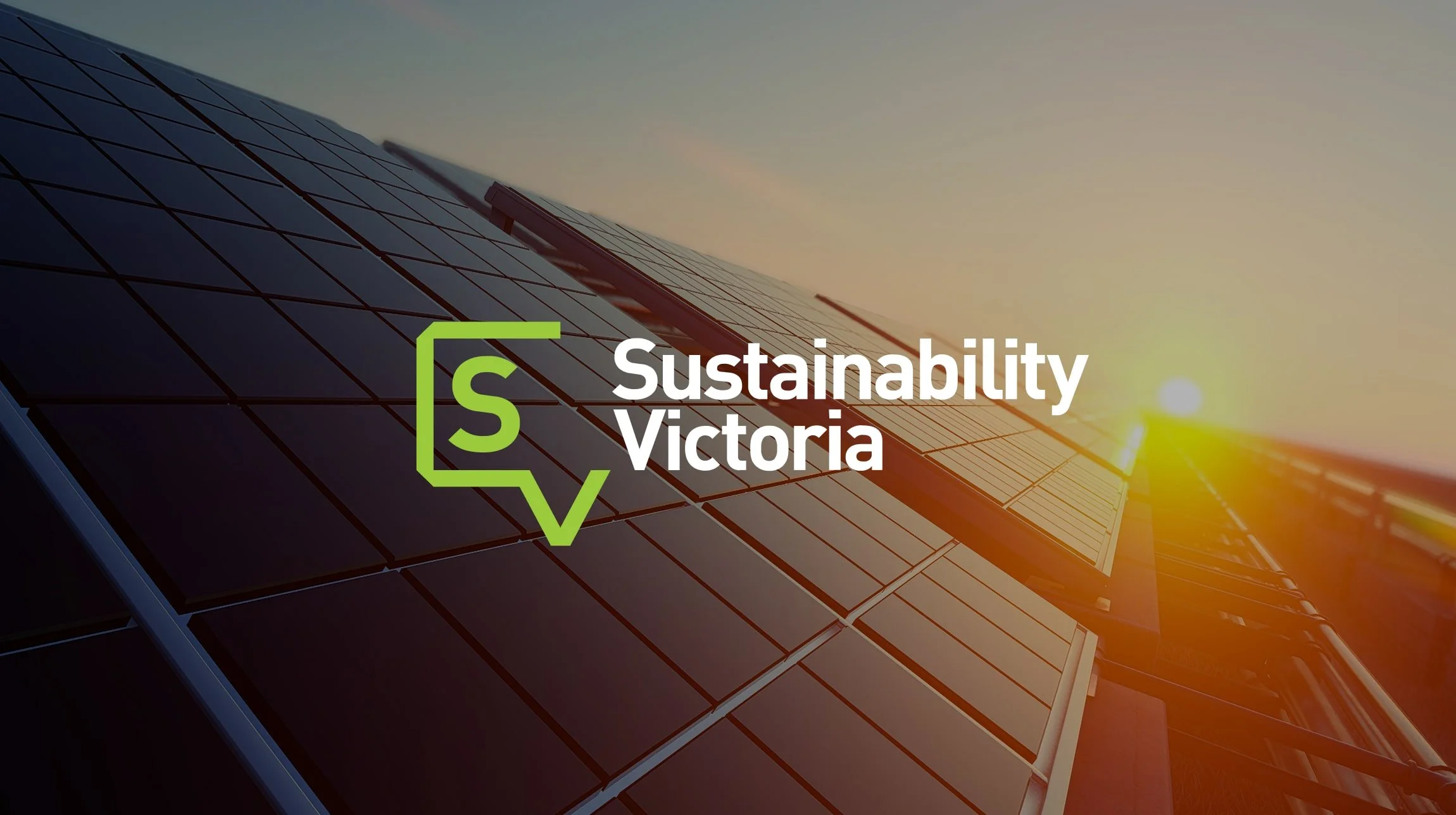 Logo of Sustainability Victoria overlaid on a photo of solar panels.