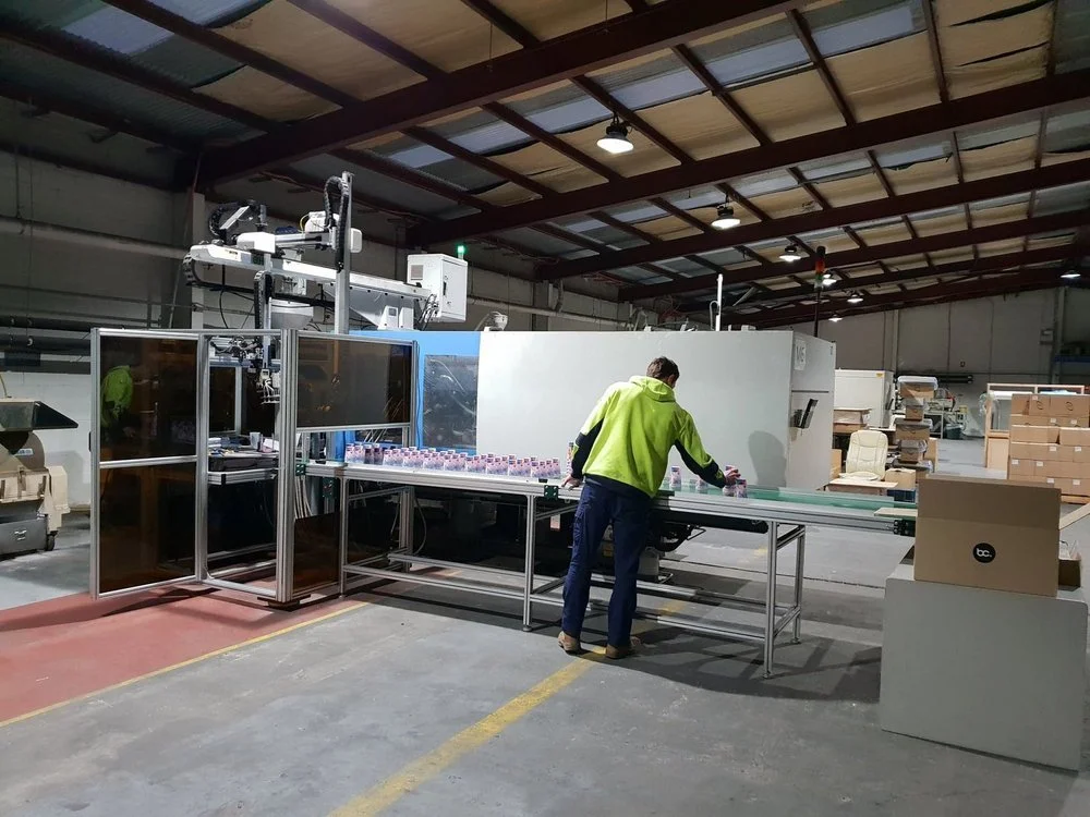 Worker at bettercup cup production facility.