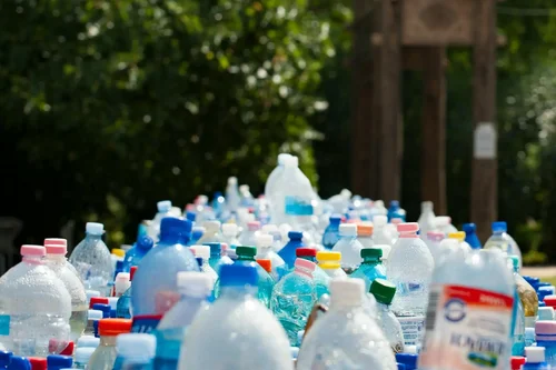 Hundreds of empty plastic bottles at a festival that will go to landfill.