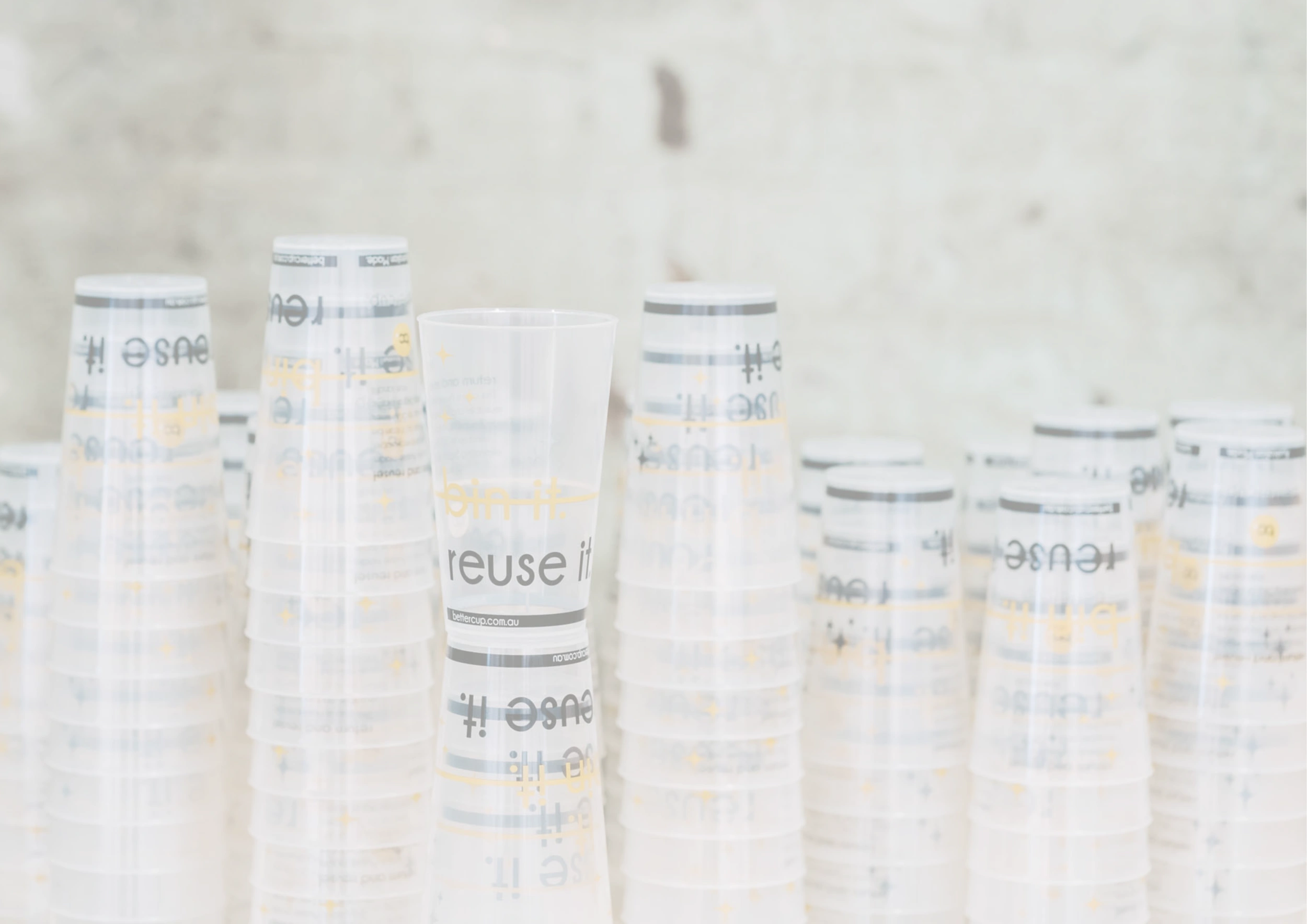 Bettercup tumblers stacked upside down.